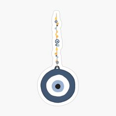 an eyeball hanging from a string on a white background sticker with blue and yellow circles