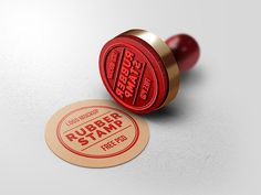 a rubber stamp with the words rubber stamp on it next to a round sticker