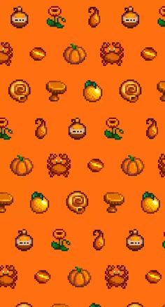 an orange background with pumpkins and other items on it, all in the same pattern