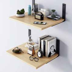 two wooden shelves with books and other items on them