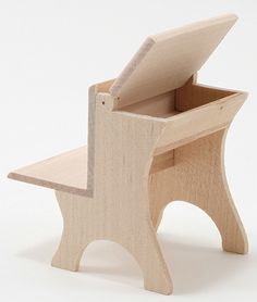 a wooden toy chair with its lid open