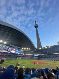 a baseball stadium filled with lots of people