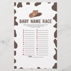 a baby name race card with brown and white cow print on it's side