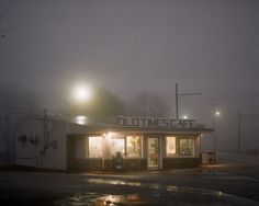 an old time cafe on a foggy night