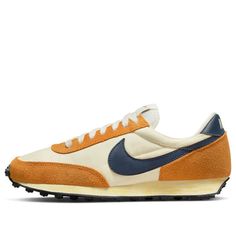 The Nike Daybreak SE 'Coconut Milk Midnight Orange' is a classic running shoe with a modern twist. Inspired by the 1979 original design, this sneaker features a waffle sole, wedge midsole, suede and fabric upper, and a bold colorway of gray, orange, and dark. Perfect for your everyday adventures, the Daybreak SE is stylish, comfortable, and ready for anything. With its timeless silhouette, this sneaker is sure to become a favorite in your wardrobe. (SNKR/Retro/Low Top/Women's/Wear-resistant) Nike Dbreak, Nike Daybreak, Nike Shoes Women Fashion, Nike Air Pegasus, Marathon Running Shoes, Round Toe Heels, Midnight Navy, Running Shoes Sneakers, New Nike