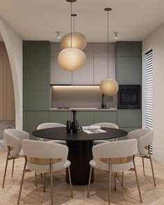 a black table surrounded by white chairs in a room with wooden flooring and lights hanging from the ceiling