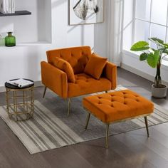 an orange chair and ottoman in a living room