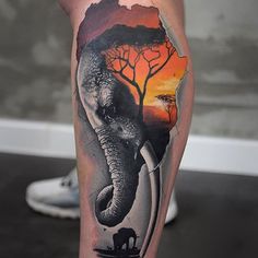 an elephant with trees on it's side and sunset in the background tattoo design