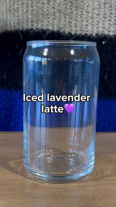 a glass jar with the words iced lavender latte on it