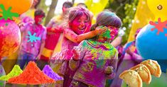 two children covered in colored powder hugging each other