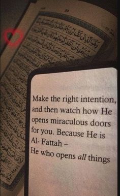 an open book with arabic writing on it and the words make the right intention, and then watch how he opens miscellaneous doors for you