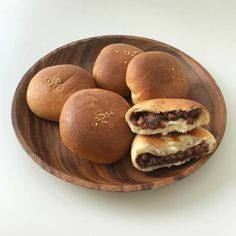 some food is on a wooden plate and ready to be eaten