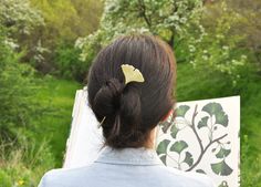 "Ginkgo leaf hair stick from brass. This item is fully handcrafted. It is made from brass sheet and thick brass wire, soldered together using silver solder, hand-engraved, hammered, textured and gently polished. The hairpin measures about 5.5\" (14 cm), the length of the stick is 4\"(10 cm). This stick can be a little bit uncomfortable for the slippery hair so please let me know in comments, I will add an extra u-shape pin for you. This item will be made just for you. The production time is abou Tiger Eye Hair, Gold Hair Pin, Beautiful Hair Accessories, Ceramic Hair, Forest Girl, Girl Accessories, Ginkgo Leaf, Hair Stick, Celestial Jewelry