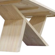 a close up of a wooden table with no one on it's legs or feet