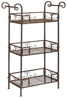 Taking inspiration from Victorian antiques, this Noreen Shelf imbues any outdoor area with vintage charm and romantic ambiance. The flourishing iron scrolls in a rustic brown finish give Noreen's three shelves elegant character, making it ideal for the porch or patio. Safavieh Noreen 42.3-in H x 28.3-in W Rustic Brown Outdoor Rectangular Wrought Iron Plant Stand | PAT5006B 3 Tier Shelf, Wrought Iron Plant Stands, Victorian Antiques, Outdoor Shelves, Iron Plant Stand, Slatted Shelves, Country Farmhouse Style, Tier Shelf, Iron Plant