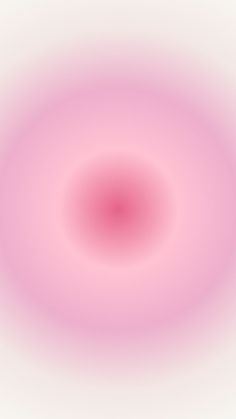 an abstract pink and white background with a circular design in the center, as if it were blurred or blurry