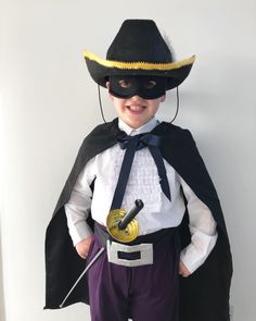 a little boy dressed up as a pirate