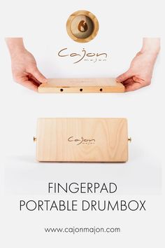 fingerpad portable drum box with hands holding it and the title, fingerpad portable drumbox