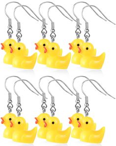 six yellow rubber ducks with metal hooks