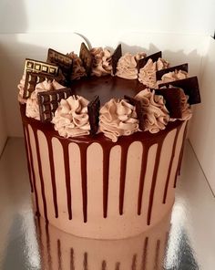 a cake with chocolate and cream frosting on top