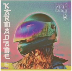 a woman wearing a helmet with the words zooe karabama on it's side