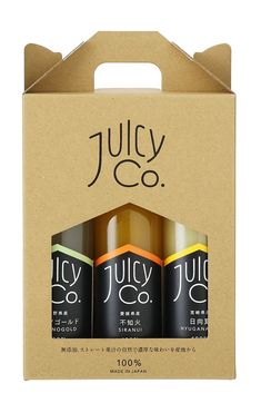 three bottles of juicy go are in a cardboard box with the packaging on it's side