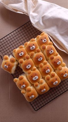 bread with teddy bears on it sitting on a cooling rack