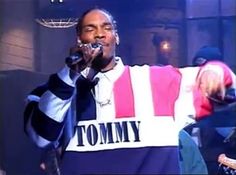 Snoop Dog wearing Tommy Hilfiger rugby sweatshirt during his SNL performance in 1994 that has since become an iconic moment. After wearing this sweatshirt it completely sold out of stores and put Tommy on the radar of many rap artists. Girbaud Jeans, Adidas Sweats, Snoop Dog, Tommy Hilfiger Polo, Tommy Hilfiger Jackets, Hip Hop Artists, Teenage Boys