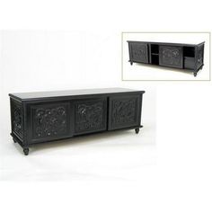 the sideboard is black and has carvings on it