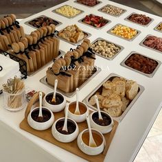 an assortment of food is displayed on a table