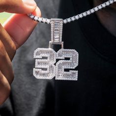 Introducing the Iced Number Baguette Pendant- the latest addition to our customs collection. Choose any number in 18k Yellow Gold or 14k White Gold and create your personalized iced out custom crafted with hand-set stones. Select any single or two digit number that holds a special meaning to you. Make a statement and elevate any look with this unique piece, only at GLD! GLD will repair or replace the item should you experience any defects in craftsmanship or breakage. Discount codes NOT valid on Baguette Pendant, Personalized Pendant, Custom Pendants, Plate Size, Custom Necklace, Discount Codes, Cz Stone, Custom Items, Custom Jewelry