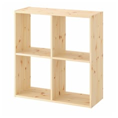 a wooden shelf with three sections on each side