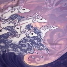 three unicorns riding on top of each other in the sky with stars and swirls