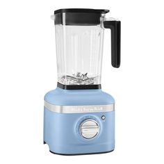 a blue blender sitting on top of a white table