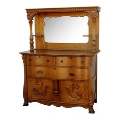 an antique dresser with mirror on top and drawers below it, isolated against a white background