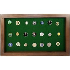 a wooden frame with many different types of buttons