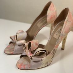 You’re Not Gonna Find The Shoes Anywhere. The Signature Bow D’orsay Scylla Wet In A Pale Pastel Yellow Gray And Pink Fabric That Looks Almost Like A Watercolor Type Of Fabric In Silk. Brand New Tips. Valentino Collectors Item For Those Who Know. Fits True To Size. No Box Or Dust Bag Pink Heels For Spring Galas, Spring Gala Pointed Toe Heels, Feminine Heels For Gala, Spring Gala Heels With Wrapped Heel, Spring Gala Wrapped Heel Shoes, Luxury Round Toe Wedding Shoes For Spring, Luxury Spring Wedding Shoes With Ankle Strap, Luxury Spring Wedding Shoes With Round Toe, Spring Gala Almond Toe Heels