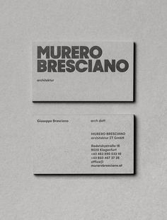 two business cards on top of each other