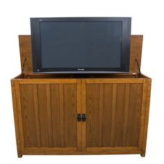 a wooden entertainment center with a flat screen tv on it's top and doors open