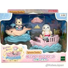 two toy mice are sitting in a boat with a baby mouse on it's back