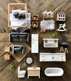 an overhead view of a doll house with furniture and accessories on the floor in it