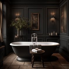 an old fashioned bathtub in a dark bathroom