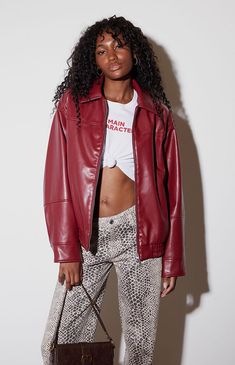 The Faux Leather Bomber Jacket from PacSun exudes a modern edge with its sleek faux leather exterior. It features long sleeves, a classic collar, a full zipper front closure, side hand pockets, an elasticized hem, and an oversized fit for a stylish, contemporary look.Faux leather exteriorLinedCollarLong sleevesFull zipper front closureSide hand pocketsElasticized hemOversized fitCoating: polyurethane; Backing: 100% polyester; Lining: 100% polyesterMachine washableModel is wearing a size small PacSun Womens Faux Leather Bomber Jacket - Red size Small Oversized Red Leather Jacket, 2024 Jacket Trends, Eyeliner Makeup Looks, Leather Jacket Outfit Fall, Red Jacket Outfit, Orange Jacket, Eyeliner Makeup, Fall Fit, Leather Jacket Outfits