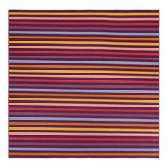 a multicolored rug with vertical stripes