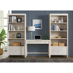 a white desk and bookcase in a room