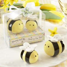 three bees are sitting in front of a package