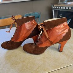 1930s vintage scalloped suede and leather lace up booties. These are so beautiful and amazing quality. The leather is soft and supple. The label inside is Fry's Fine Footwear Hollywood & San Francisco. The other label is Lewis genuine hand turned footwear. There is some numbers inside the shoes but I can't make out a size so go by the measurements. I think this is a size 5.5 or 6. It measures 9.25" heel to toe inside and 2 7/8" width. Vintage Suede, Lace Up Booties, Shoes Booties, Tie Shoes, Womens Oxfords, Vintage Shoes, Leather And Lace, Lace Up, Hollywood