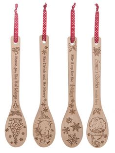 three wooden spoons with christmas designs on them, one is red and the other has white polka dots