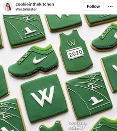 cookies decorated with green and white sports uniforms