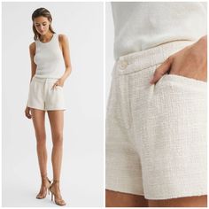 The Cream Patrizia Shorts Are A Lightweight Option For Warm-Weather Styling. They’re Crafted From A Cotton-Blend With A Textured Feel, And They Sit High-Rise On The Frame. Pair With The Coordinating Jacket And High Heels For A Heritage Look. Or, Keep It Casual By Tucking In A Vest And Wearing Flats. Cotton Blend. Textured Fabrication. High Rise. Zip Fly And Button Closure. Side Slip Pockets. 93% Cotton, 7% Nylon. Smoke Free Home Bin F Elegant Short Pants For Summer, Elegant Short Summer Pants, Elegant Beige Shorts With Short Inseam, Elegant Shorts With Pockets, Elegant Summer Shorts, Elegant Beige Bottoms With Short Inseam, Elegant Beige Shorts, Elegant Summer Pants With Built-in Shorts, Elegant Short Inseam Summer Pants